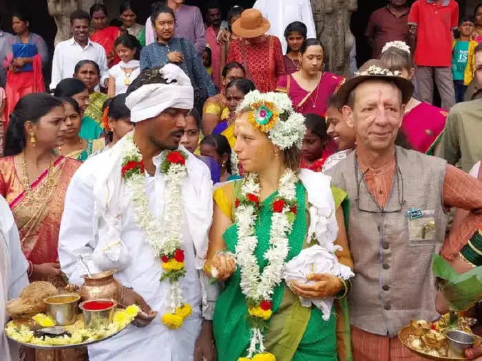 Karnataka Auto driver marries a Belgium girl in Hampi