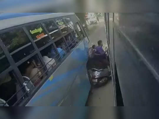 பேருந்துகளுக்கிடையே சிக்கி... கைக்குழந்தையுடன் நூழிலையில் உயிர் தப்பிய தம்பதி!